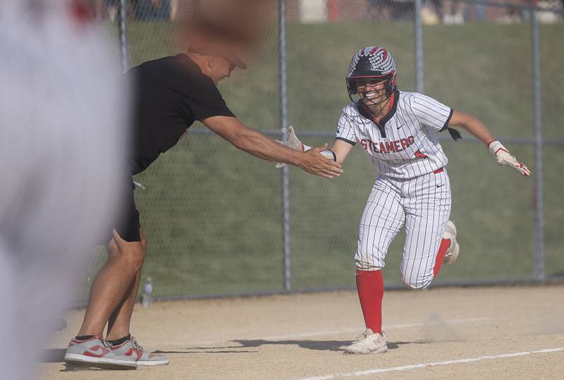 Fulton’s Zoe Kunau celebrates her two-run walk off homer to defeat Orangeville Tuesday, May 26, 2026, at the Eastland Class 1A softball sectional quarterfinal.