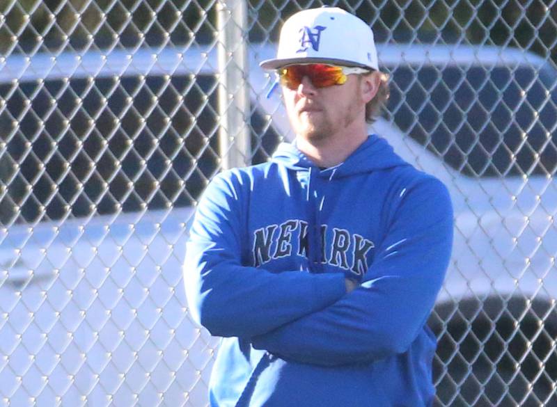 Newark head boys baseball coach Josh Cooper coaches his team against Marquette on Monday, March 23, 2026 at Newark High School.