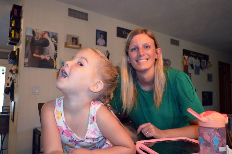 Aislynn Skinner, 4, of Oregon, makes a silly face in a photo with her mom, Jessica Skinner, in their home on Sept. 6, 2023. Aislynn, who was diagnosed with a critical congenital heart defect in utero, was selected as an American Heart Association Community Youth Heart Ambassador for the 2023-24 school year.