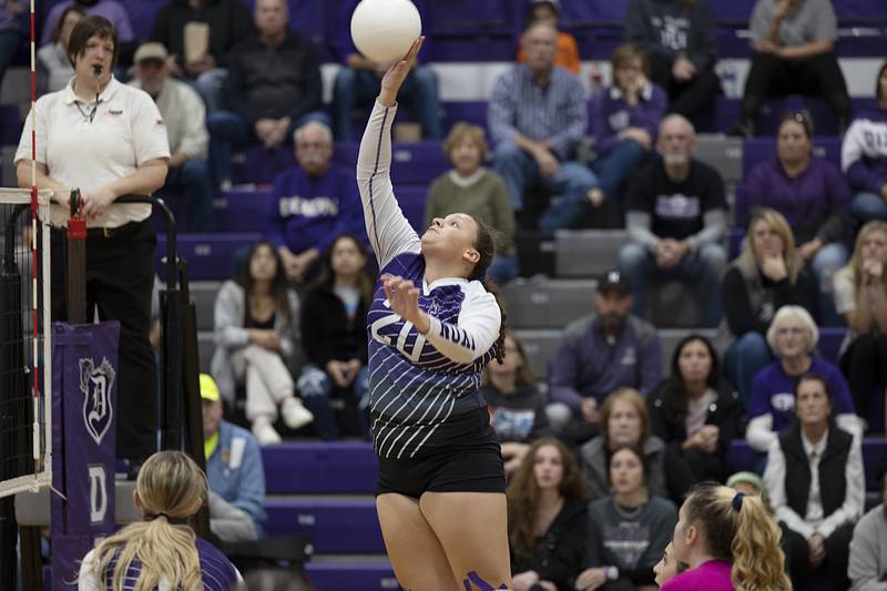 Dixon’s Olivia Cox hammers a shot Thursday, Oct. 27, 2022 in the volleyball regional final against Galesburg.