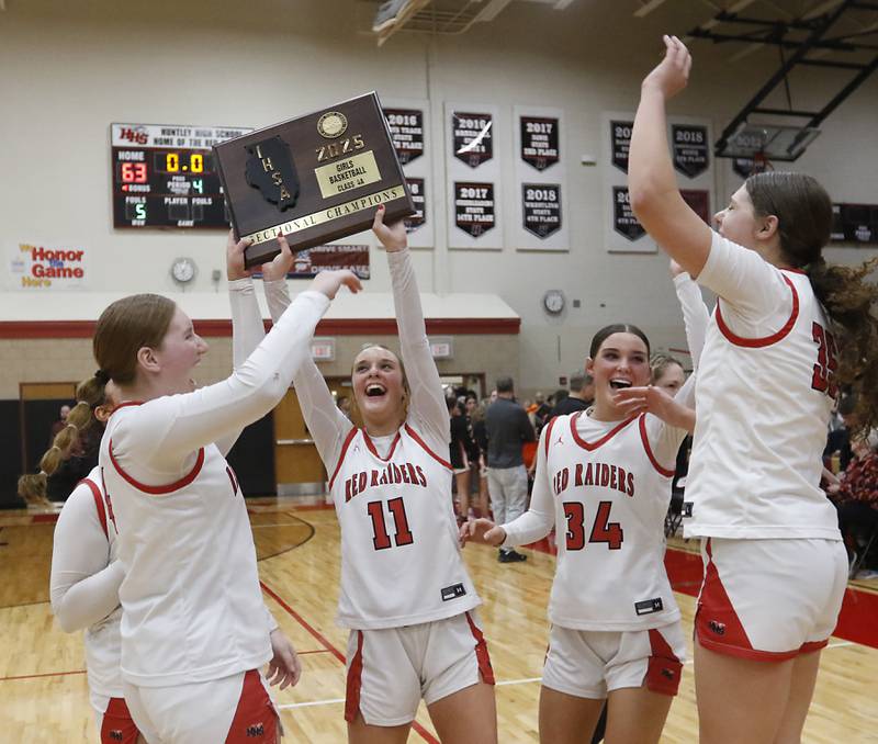 Huntley's Madison Diaz, (left) Isabella Boskey, (second from left) Anna Campanelli, (center) Ava Mcfadden, (second from right) and Paula Strzelecki (right) celebrate Huntley’s win over Libertyville in the IHSA Class 4A Huntley Sectional Championship girls basketball game on Thursday, Feb. 27, 2025, at Huntley High School.