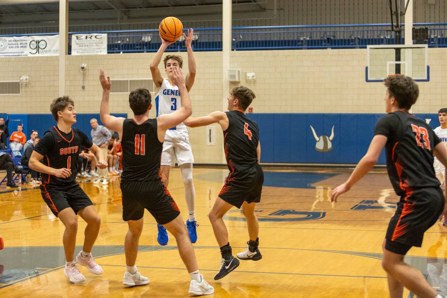 Geneva's Nathan Palmer shoots a jumper against Wheaton Warrenville South on Wednesday, Dec.10,2025 in Geneva.