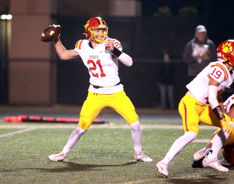 Batavia quarterback Ryan Boe looks to throw the ball during a game at Wheaton Warrenville South in Wheaton on Friday, Oct. 13, 2023.