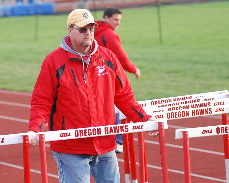 Oregon boys track & field coach Jim Spratt has been named to the Illinois Track & Cross Country Coaches Association Hall of Fame, and will be inducted at the annual ITCCCA banquet and clinic on Saturday.