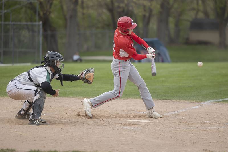 Oregon’s Gavin Morrow drives in a run against Rock Falls Tuesday, May 2, 2023.