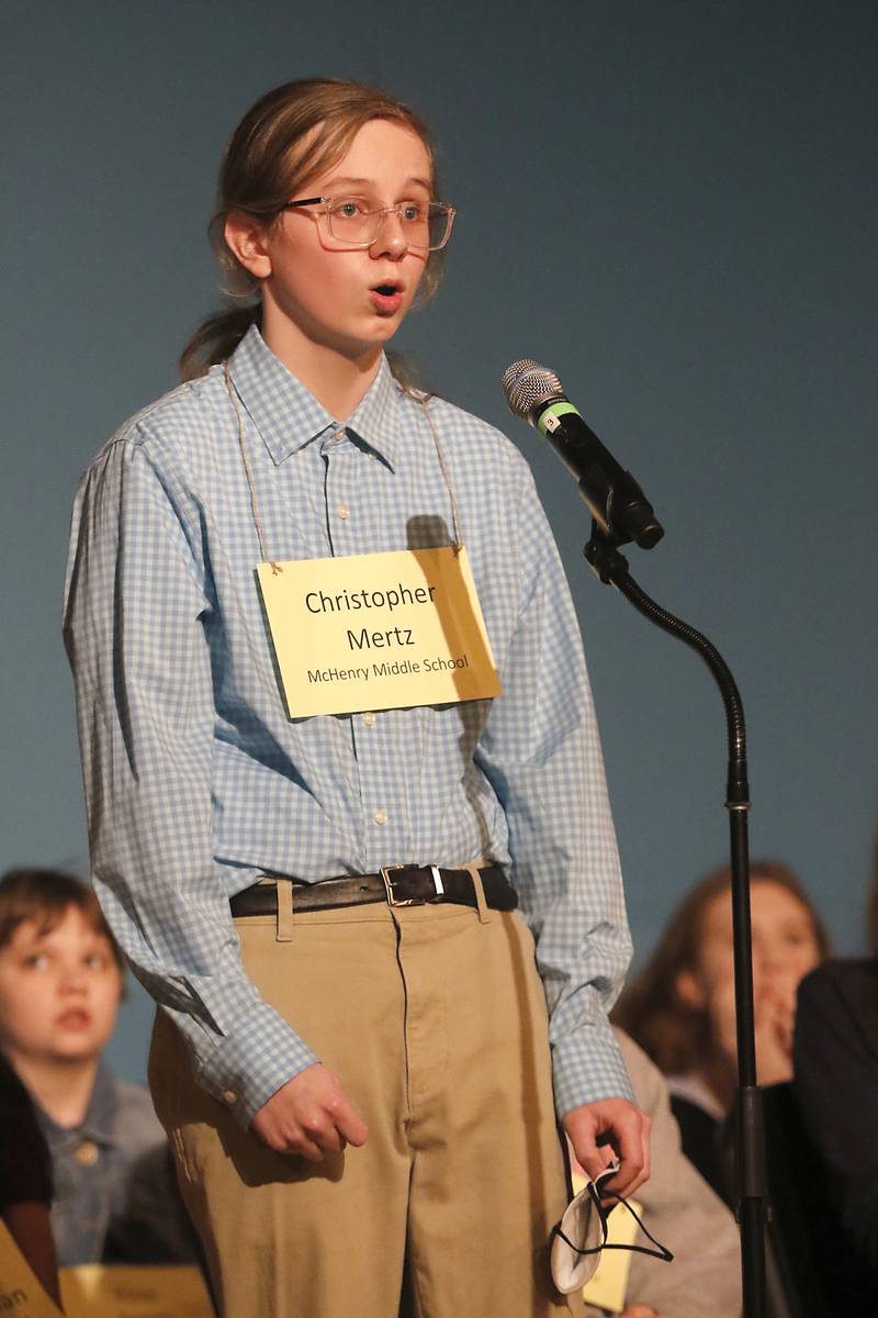 Christopher Mertz of McHenry Middle  spells a word as he competes in the McHenry County Regional Office of Education 2023 Spelling Bee Wednesday, March 22, 2023, at McHenry County College's Luecht Auditorium in Crystal Lake.