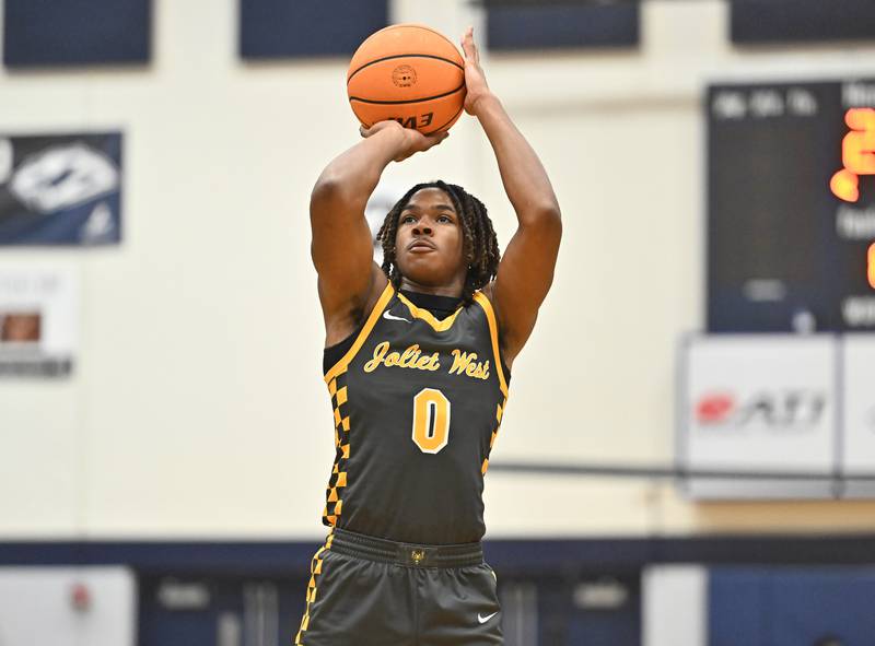 Joliet West's Aamir Shannon shoots a free throw during the conference game against Plainfield South on Friday, DEC. 05, 2025, at Plainfield.