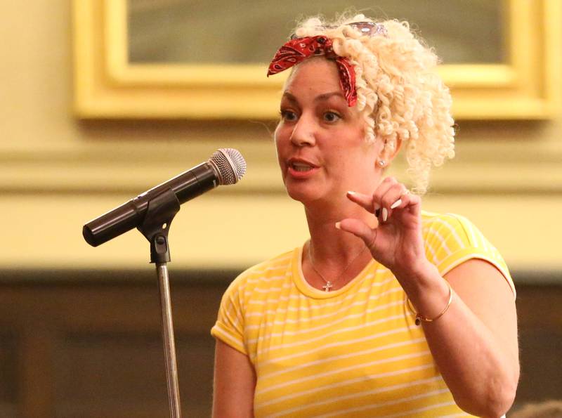 La Salle resident April Stevenson speaks during the Carus town hall meeting on Wednesday, May 10, 2023 in Matthiessen Auditorium at LaSalle-Peru Township High School.