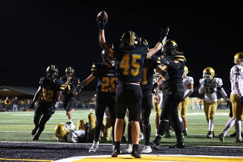 Herscher's Jaxon Sukley celebrates a touchdown during the Tigers' 45-28 loss to Bishop McNamara on Friday, Sept. 5, 2025.