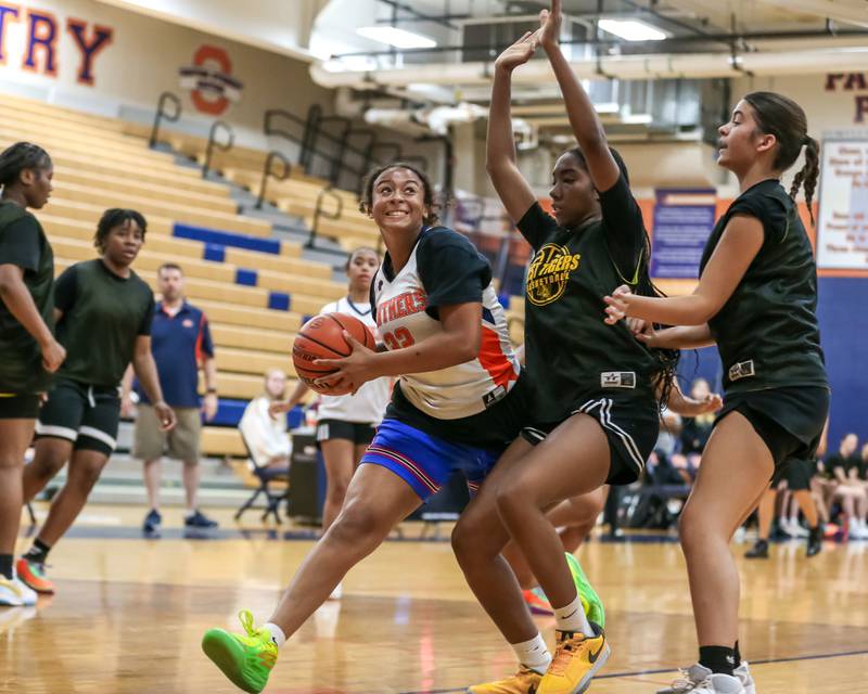 Oswego's Ahlivia East drives to the basket at the Oswego girls basketball shootout tournament. June 28, 2024.