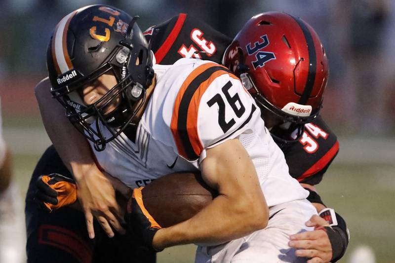 Huntley's Haiden Janke gets the tackle on Crystal Lake Central's Brent Blitek in their season opening football game on Friday, Aug. 27, 2021 at Huntley High School in Huntley.