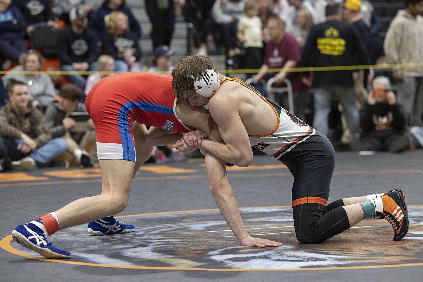 Sandwich’s Cooper Corder controls Morrison’s Caleb Modglin in the 150 pound first place match Saturday, Feb. 14, 2026, during the Class 1A wrestling sectionals in Byron.
