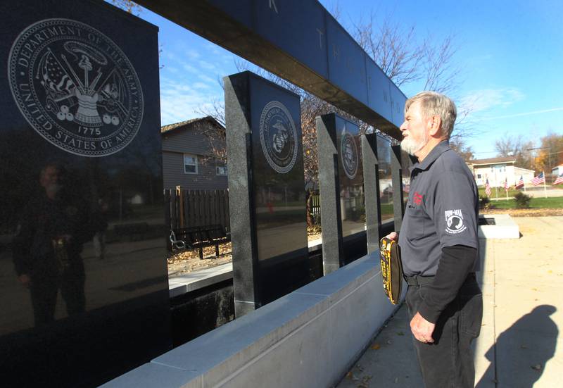 Paul Baumunk, former mayor of Lindenhurst and Army veteran who served in Vietnam, looks at the Paul Baumunk Veterans Memorial (which bears his name) at the entrance to the Lindenhurst Village Hall after the Veterans Day Ceremony at the Public Works garage behind the Village Hall on November 11th.
Photo by Candace H. Johnson for Shaw Local News Network
