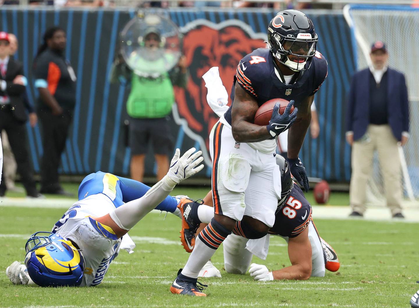 Chicago Bears running back D'Andre Swift jumps over Los Angeles Rams linebacker Michael Hoecht on his way to the end zone scoring on a long run during their game Sunday, Sept. 29, 2024, at Soldier Field in Chicago.