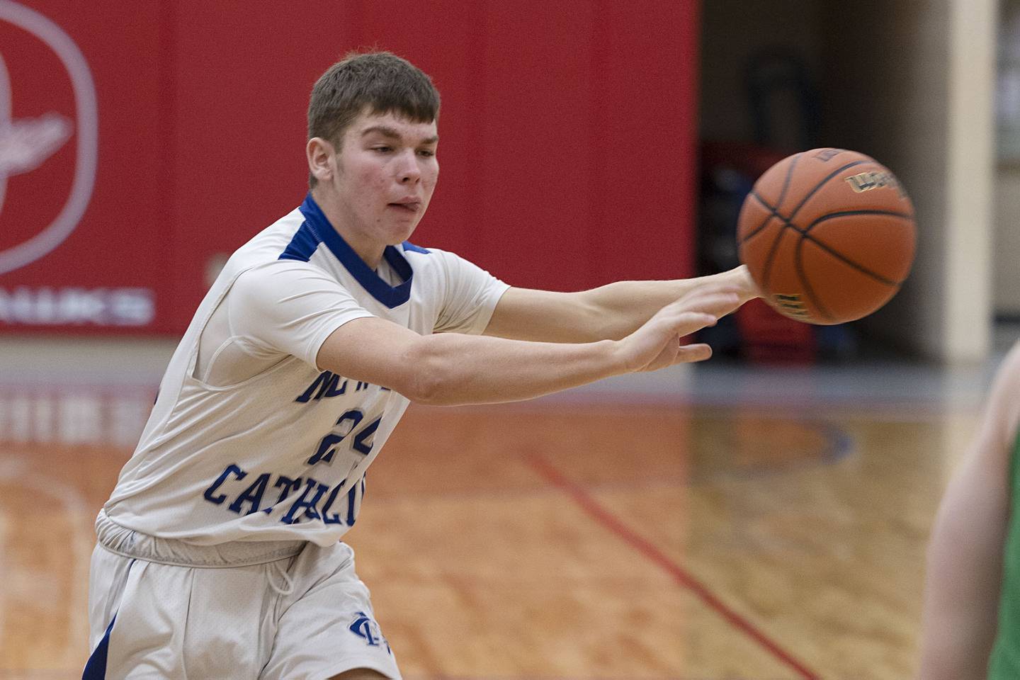 Newman's Lucas Kolb passes the ball Monday, Nov. 21, 2022 while playing North Boone in the Oregon Thanksgiving Tournament.