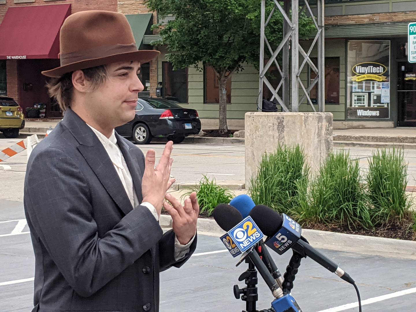 Out in Fox Valley founder and president Michael Stroud spoke at a ceremony Wednesday morning after St. Charles Mayor Lora Vitek raised the first Pride flag in the city's history.