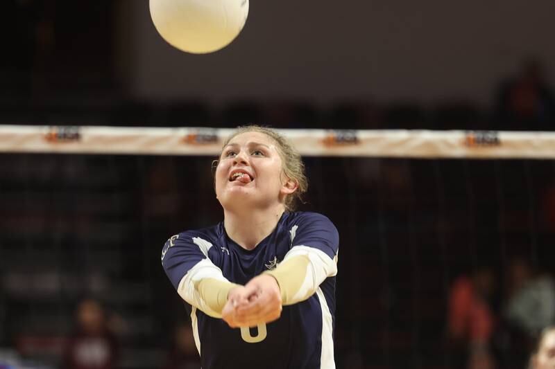 IC Catholic’s Lucy Russ runs down the ball against Genoa-Kingston in the Class 2A championship match on Saturday in Normal.