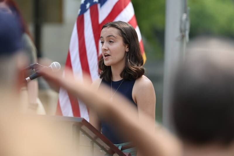 Payton Fraser, of Joliet West H.S., sings the National Anthem at a special Flag Day ceremony dedicating a memorial to remember the 28 World War II Submarines that traveled through Joliet on their way to the Pacific theater in Bicentennial Park on Wednesday, June 14, 2023 in Joliet.