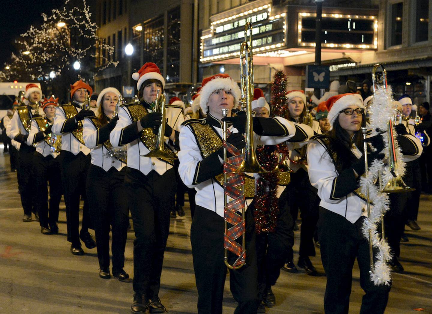 Joliet Township West marching band members with santa hats on at the Light up the Holidays Tree Lighting and Parade Van Buren Plaza Downtown Joliet,Illinois on Friday, November 29, 2013. | Larry Kane/For Sun-Times Media