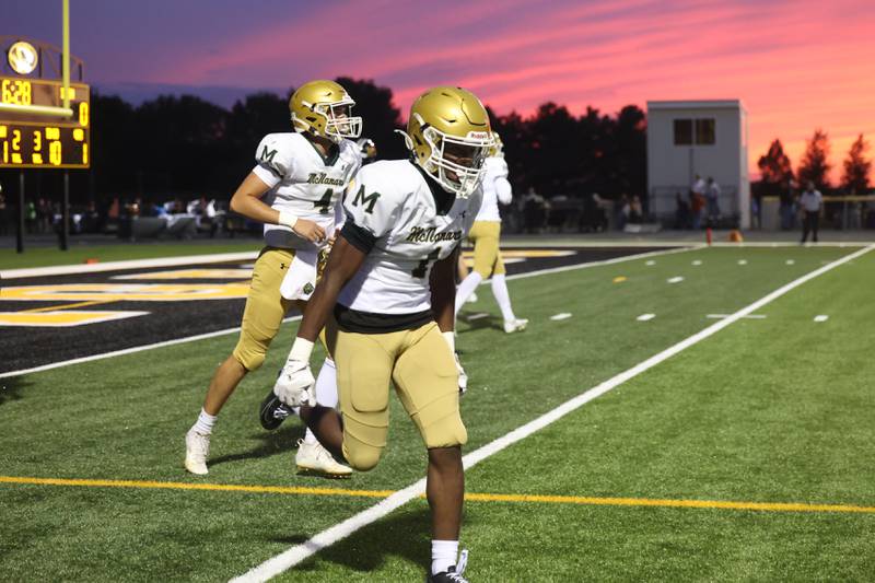 Bishop McNamara's Malachai Lee celebrates after running in a touchdown during the Fightin' Irish's 45-28 victory over Herscher on Friday, Sept. 5, 2025.