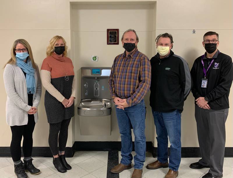 Dixon Rotary Club, which is working to provide clean water throughout Dixon Public Schools, dedicated its 12th bottled water fountain in the district at Washington School on Thursday morning. From left are Rotarians Jennifer Heintzelman, Stephani Chandler, Don Lovett, Larry Farley and Washington School Principal Jeff Gould.
