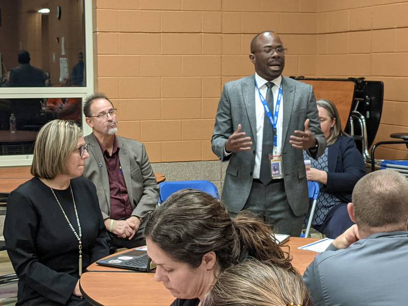 Raphael Obafemi, Oswego School District’s chief financial officer and chief school business official, speaks during a session that was part of a public forum Nov. 4 at Plank Junior High School.