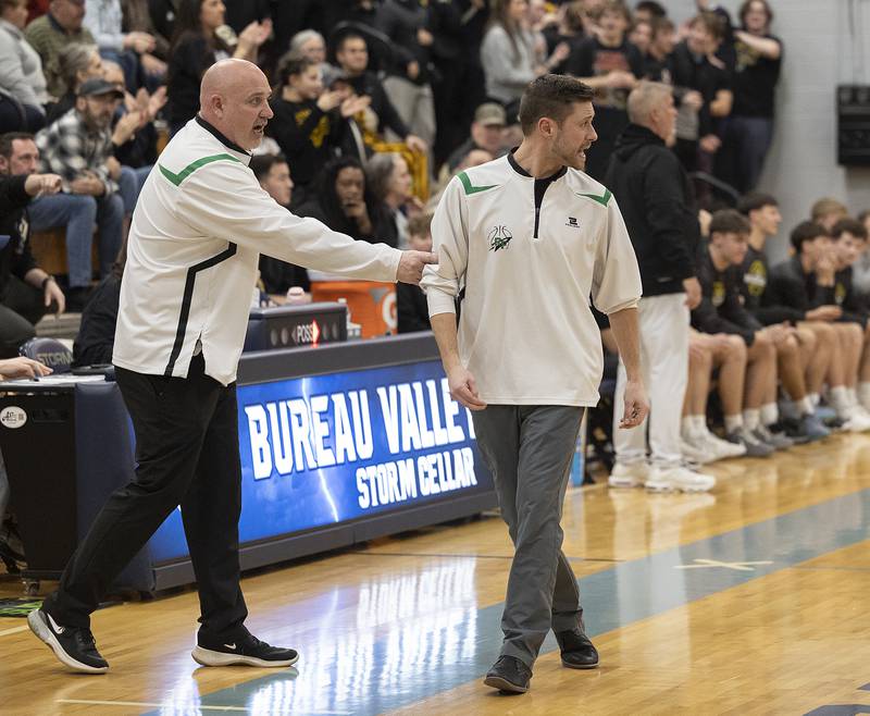 Rock Falls coach Zach Sandroks (right) hollers from the sidelines after his team was called for a pair of technical fouls against Riverdale Friday, Feb. 28, 2025, during the Class 2A Regional final at Bureau Valley High School.
