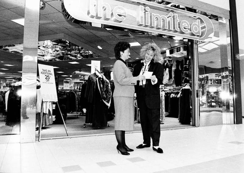 People pose outside "The Limited" store at the Peru Mall in 1989.