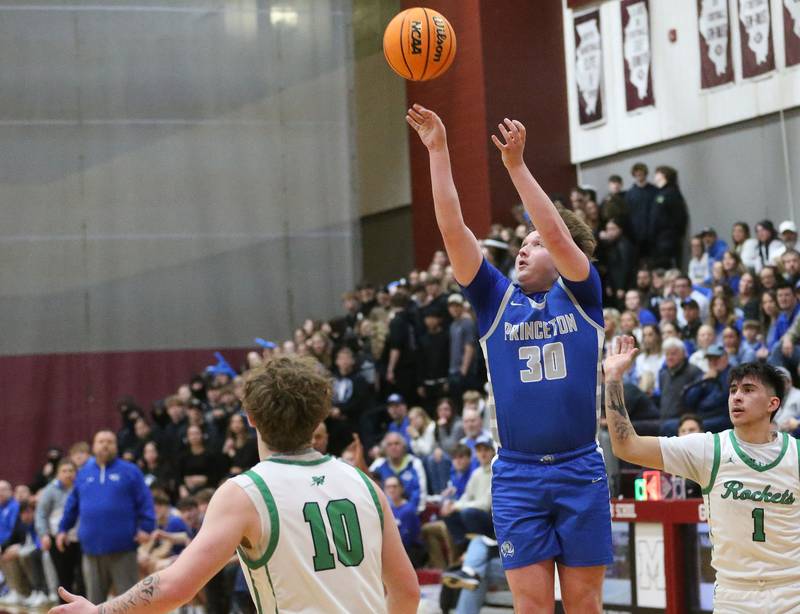 Princeton's Jordan Reinhardt lets go of a shot over Rock Falls's Kuitim Heald during the Class 2A Sectional final on Friday, March 7, 2025 at Marengo High School.