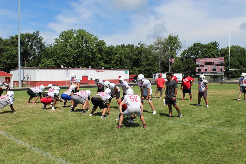 The Streator Bulldogs football team runs through drills Wednesday, July 16, 2025, during practice at Doug Dieken Stadium.