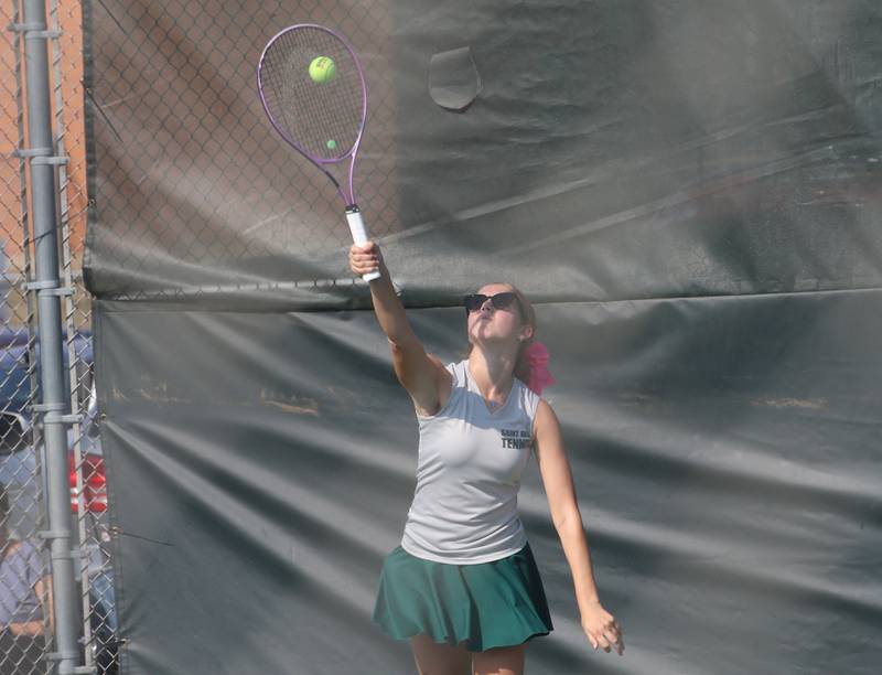 St. Bede's Chipper Rossi serves during the Class 1A girls tennis sectionals on Thursday, Oct. 16, 2025 at Ottawa High School.