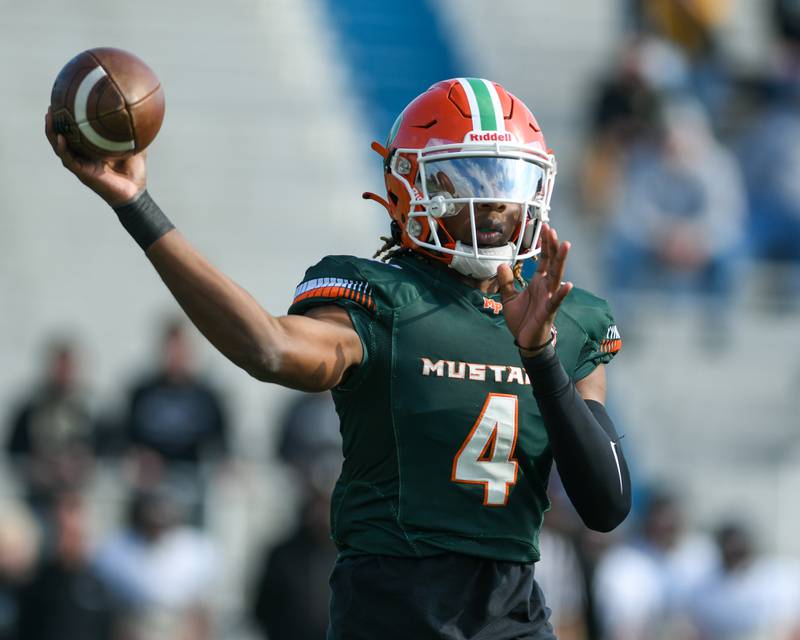 Morgan Park's Marcus Thaxton (4) completes a pass in the first quarter on Saturday Nov. 4, 2023, while taking on Sycamore at Gately Stadium in Chicago.