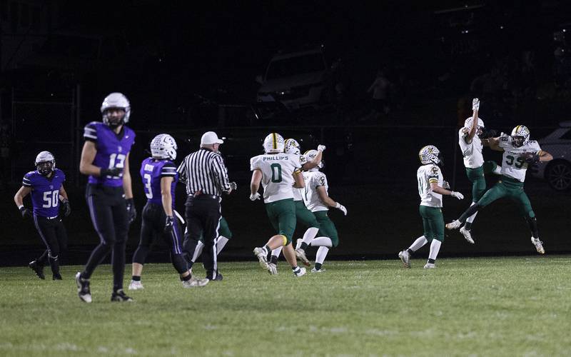 Coal City’s Trace Wilson celebrates a fumble recovery ran back for a TD against Dixon Friday, Nov. 7, 2025.