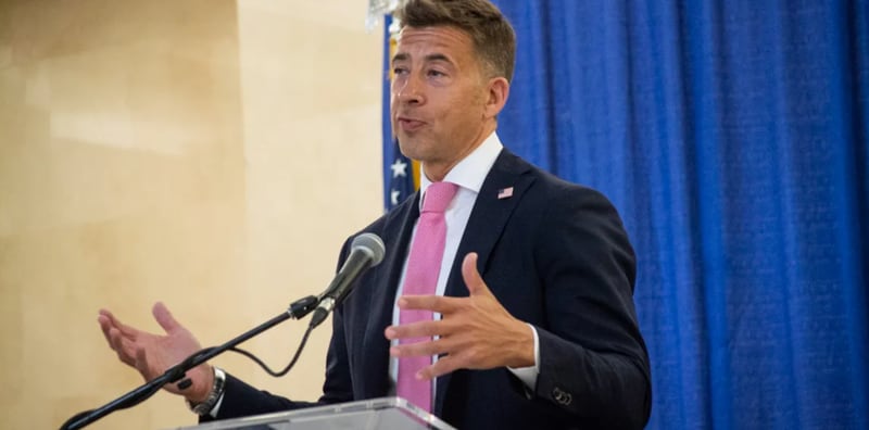 Secretary of State Alexi Giannoulias speaks at an event in Springfield in May 2025.