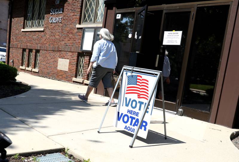 Voters leave the Sugar Grove Community Center for the General Primary Election on Tuesday, June 28, 2022.