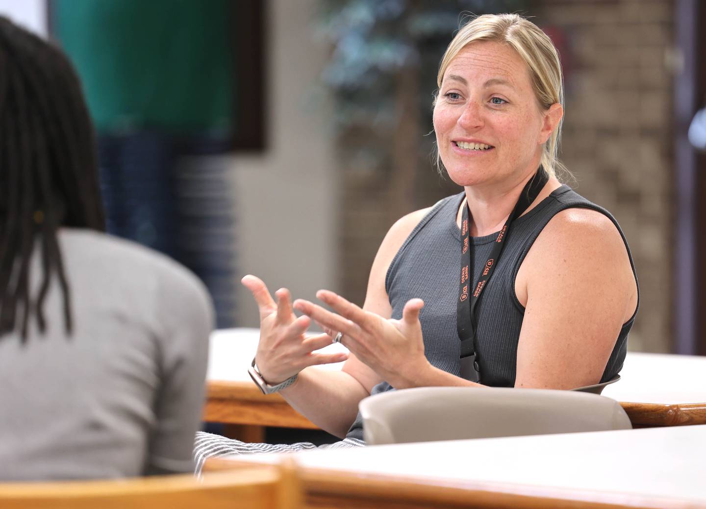 Adrien Fell, from the Early Learning Development Center, talks Monday, May 22, 2023, at Huntley Middle School in DeKalb, about what the Northern Illinois University psychologist program means to her and how it will help her and other participants achieve their goals.