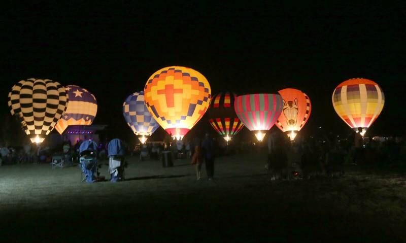 Hot air balloons glow during the 52nd annual Homestead Festival at Zearing Park on Saturday, Sept. 9, 2023 in Princeton.