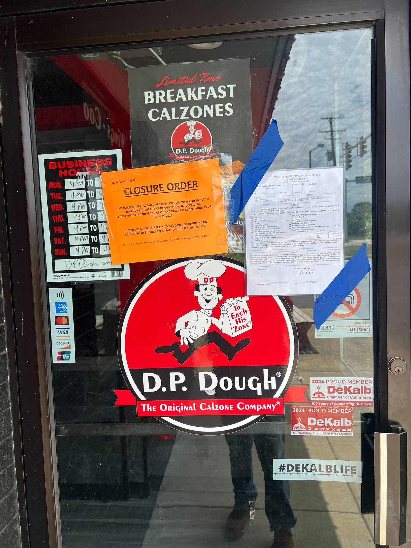 The city of DeKalb this week shut down the calzone establishment D.P. Dough, alleging the business violated municipal code by failing to pay its local restaurant taxes.
The business, seen here on Wednesday, June 26, 2024, at 215 W. Lincoln Highway, was ordered to cease and desist from operations as of June 25, according to a closure order that could be seen on the front door of the business Wednesday.
