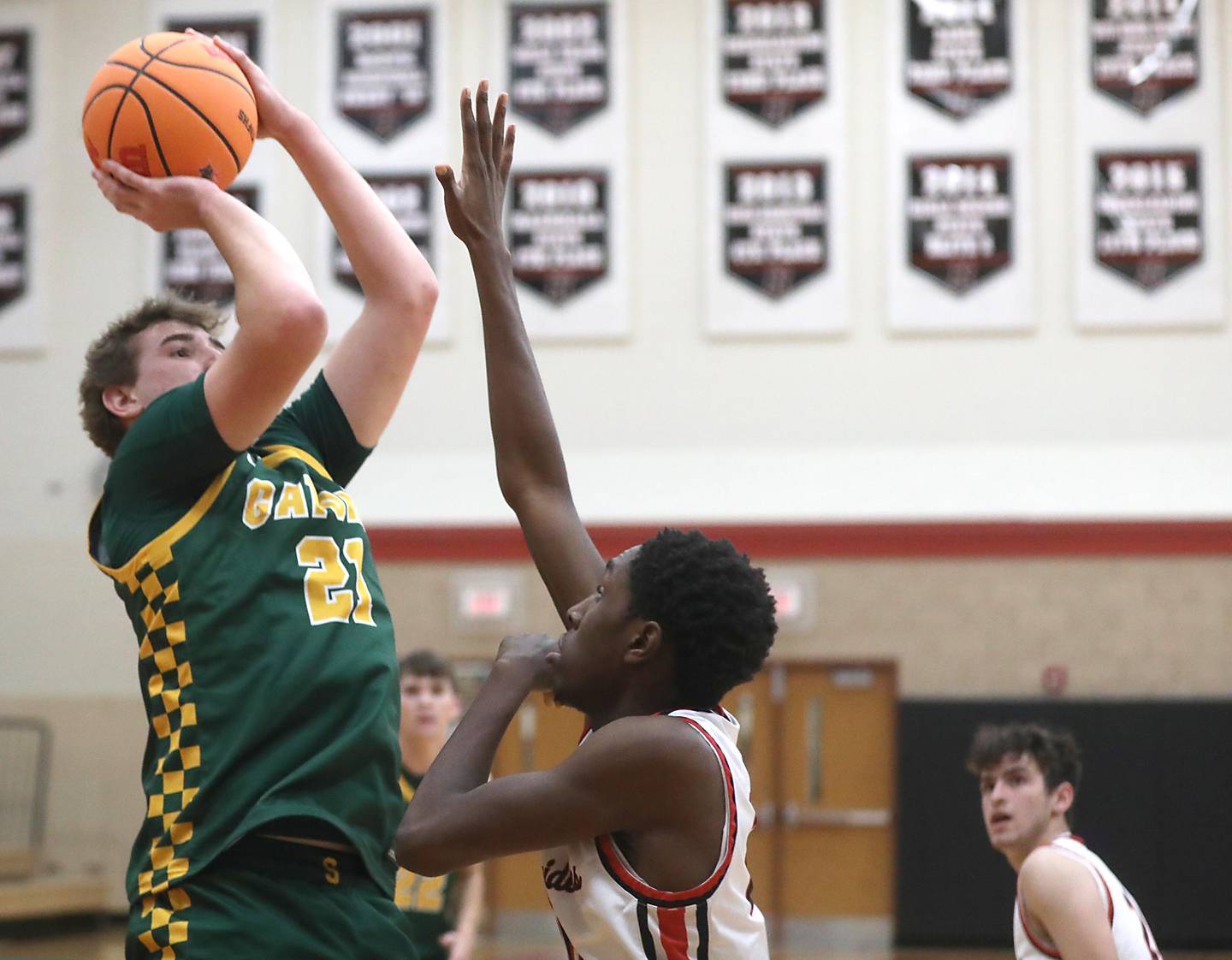 Crystal Lake South's Ryan Morgan shoots the ball over Huntley's Isaiah Onu during a Fox Valley Conference boys basketball game on Wednesday, Dec. 10, 2025, at Huntley High School.