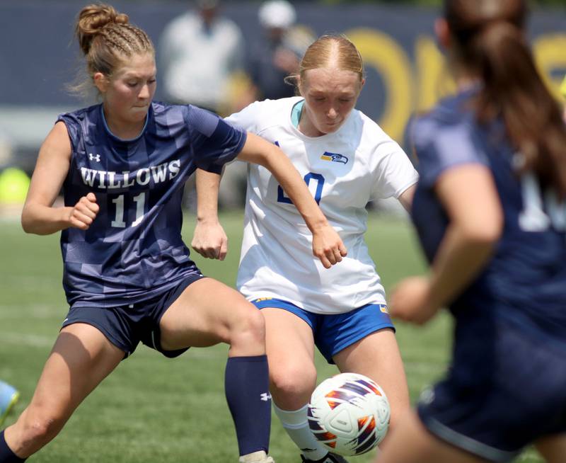 Johnsburg’s Kayla Hiller, right, battles Willows Academy’s Julia Lechner in IHSA Class 1A Supersectional soccer action at Dominican University in River Forest on Saturday, May 31, 2025.