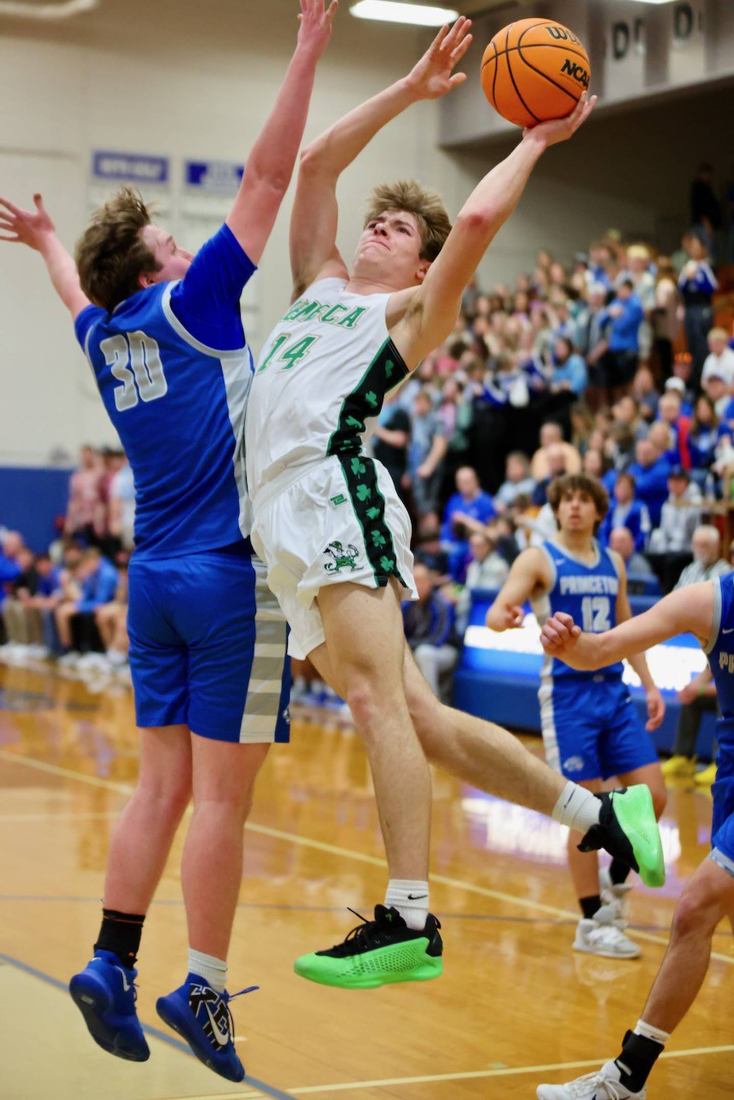 Seneca's Cameron Shirley twists and shoots in Friday's regional championship at Princeton. The Tigers won 59-53 to claim their fourth straight regional title.