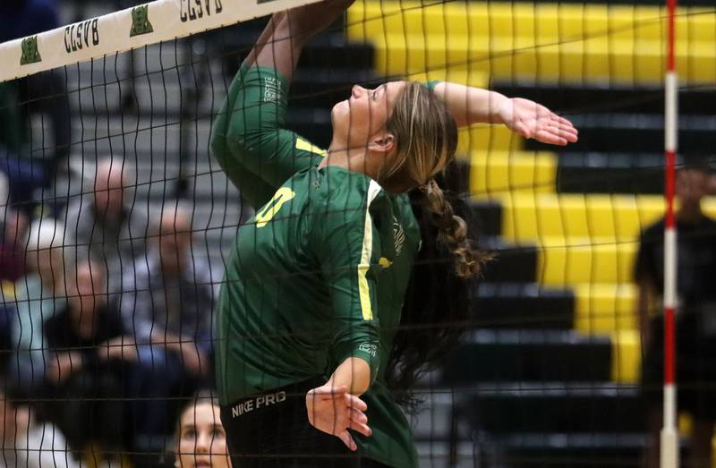Crystal Lake South’s Bobbi Wire prepares to hammer the ball against Crystal Lake Central  in varsity volleyball at Crystal Lake South High School in Crystal Lake on Tuesday, Oct. 7, 2025.