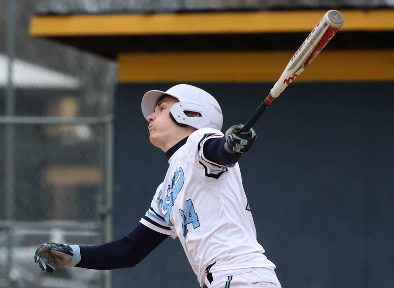 Parkview Christian Academy's Matthew Busch watches watches the ball travel over the fence for a home run Thursday, April 17, 2025, during their game at Hiawatha High School in Kirkland.