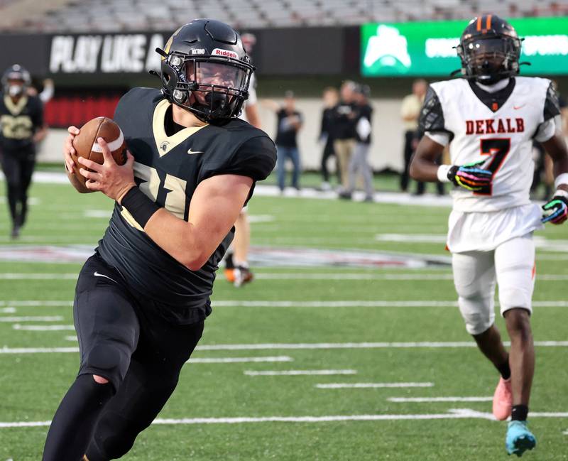 Sycamore's Cooper Bode carries the ball across the goalline after getting behind the DeKalb defense for a long touchdown reception on fourth down Friday, Aug. 29, 2025, during the FNBO Challenge in Huskie Stadium at Northern Illinois University.