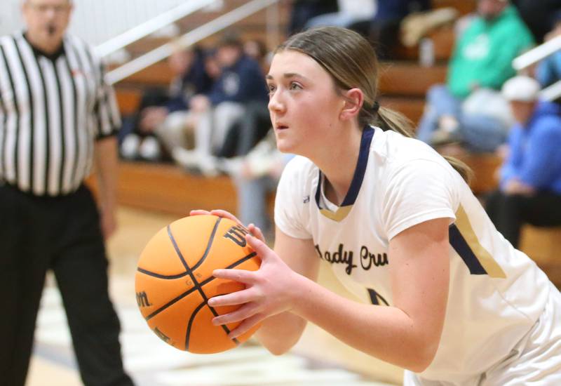 Marquette's Hunter Hopkins eyes the hoop while playing St. Bede during the Tri-County Conference championship game on Thursday, Jan. 23, 2025 at Roanoke-Benson High School.