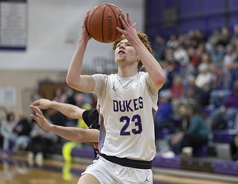 Dixon’s Austin Hicks goes strong to the hoop against Stillman Valley Thursday, Dec. 14, 2023 at Dixon High School.