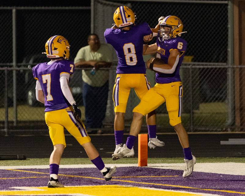 Corbin Furar celebrates his running touchdown with teammate William Musanovic during the game during the game at The Jeff Prusator Athletic Complex on September 12, 2025 at Mendota High School.