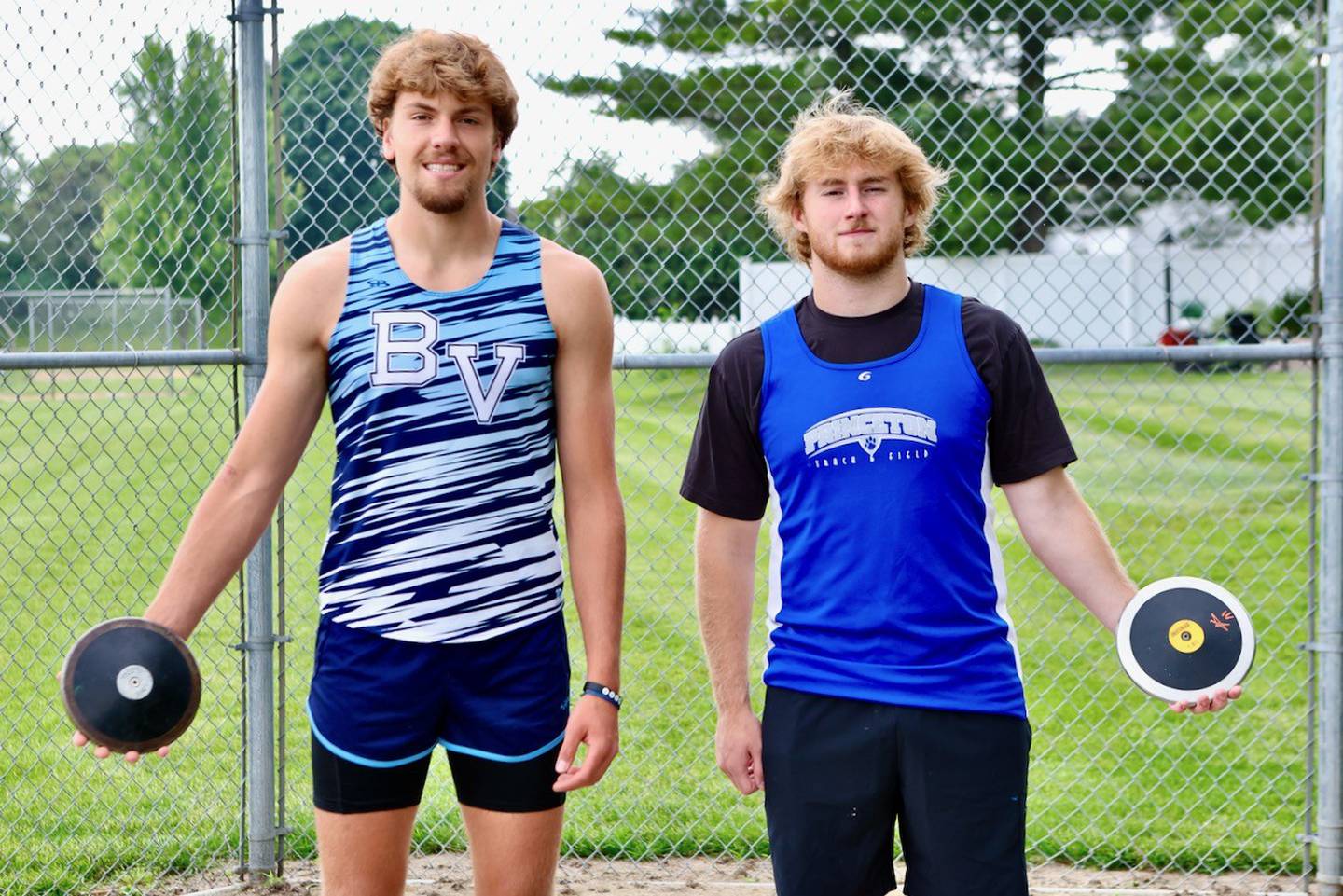 Bureau Valley's Landon Hulsing (left) and Princeton's Ian Morris brought home two state championships in the discus to Bureau County. Morris won the 2A title while Hulsing set a school record to win the 1A crown.
