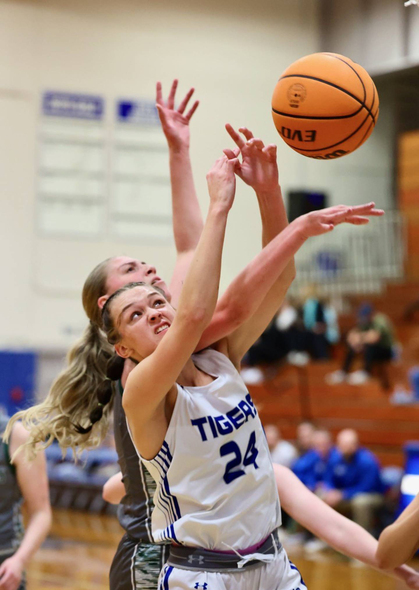 Princeton's Keighley Davis gets tangled up against Midland Thursday night at Prouty Gym. The Tigresses won 69-34 to improve to 3-0 and advance to Saturday's championship game.