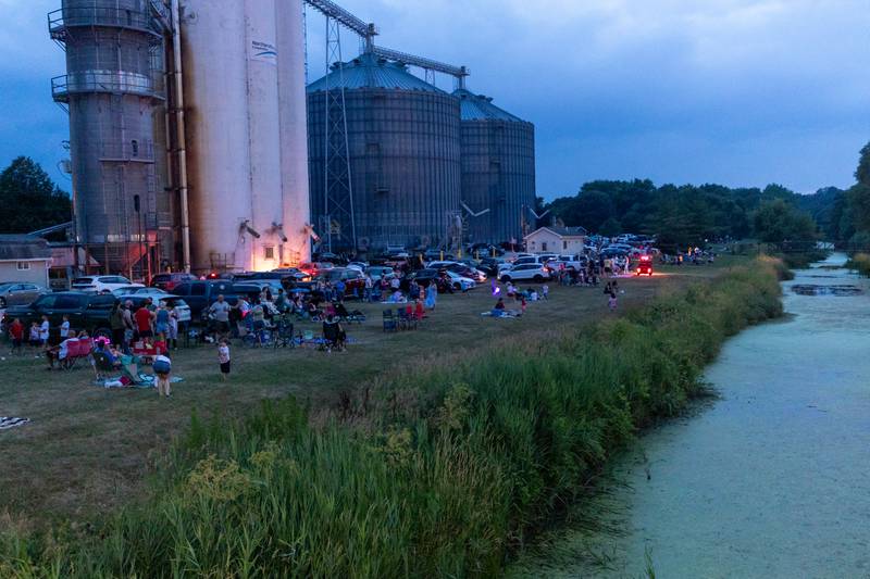 Crowd awaits firework show near silo’s on Saturday, July 5, 2025 on South Clark Street in Utica.